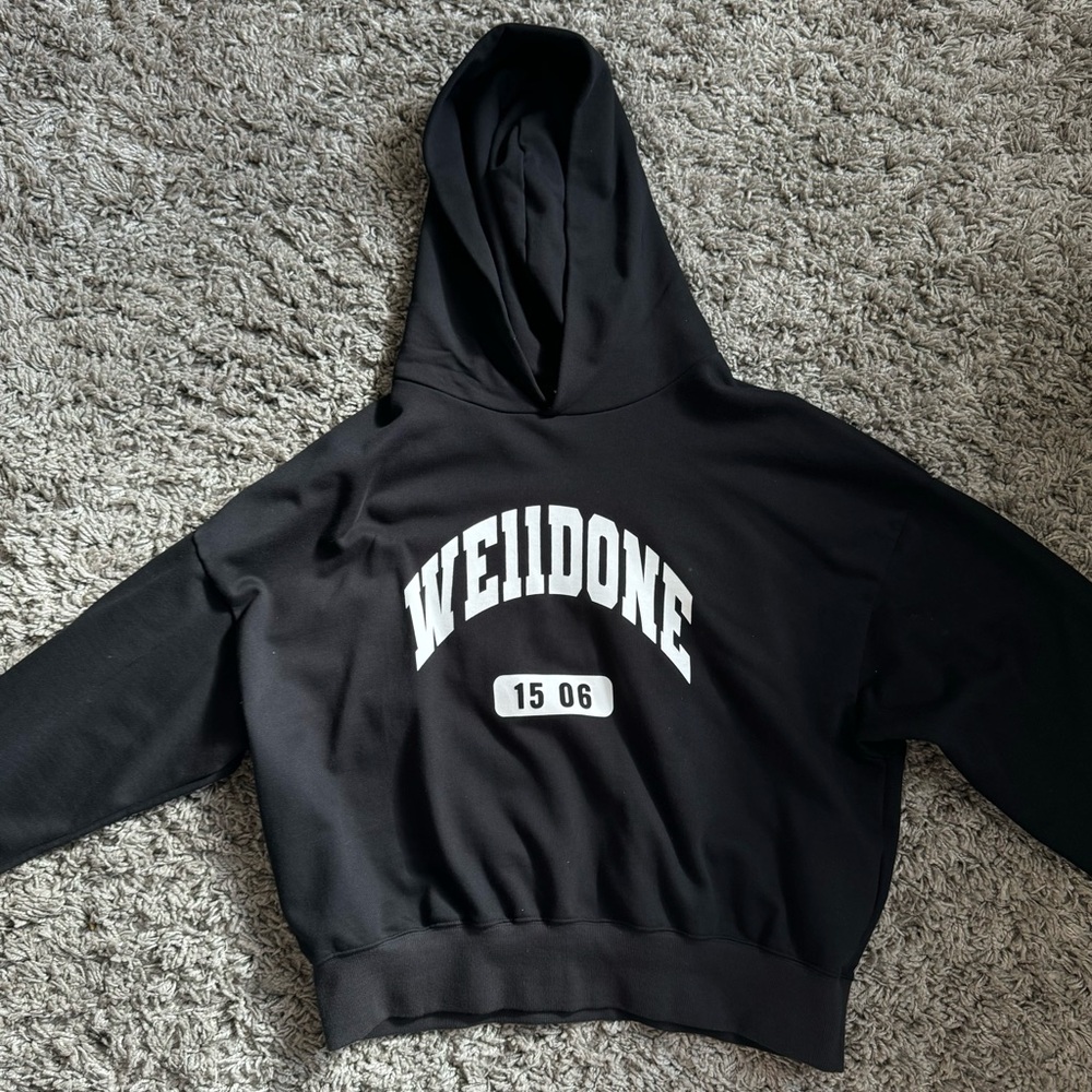 WE11DONE
Black Printed Hoodie
Size L